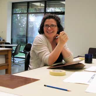 Amy Cutler working on etching plates in the studio.