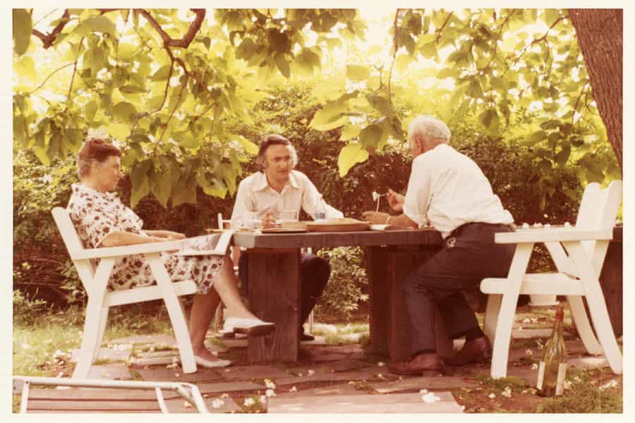 Tatyana Grosman, Larry Rivers, and Maurice Grosman eating outside of Skidmore Place under the Catalpa Tree, 1970. 1970 - Tatyana Grosman, Larry Rivers, and Maurice Grosman eating outside of Skidmore Place under the Catalpa Tree.