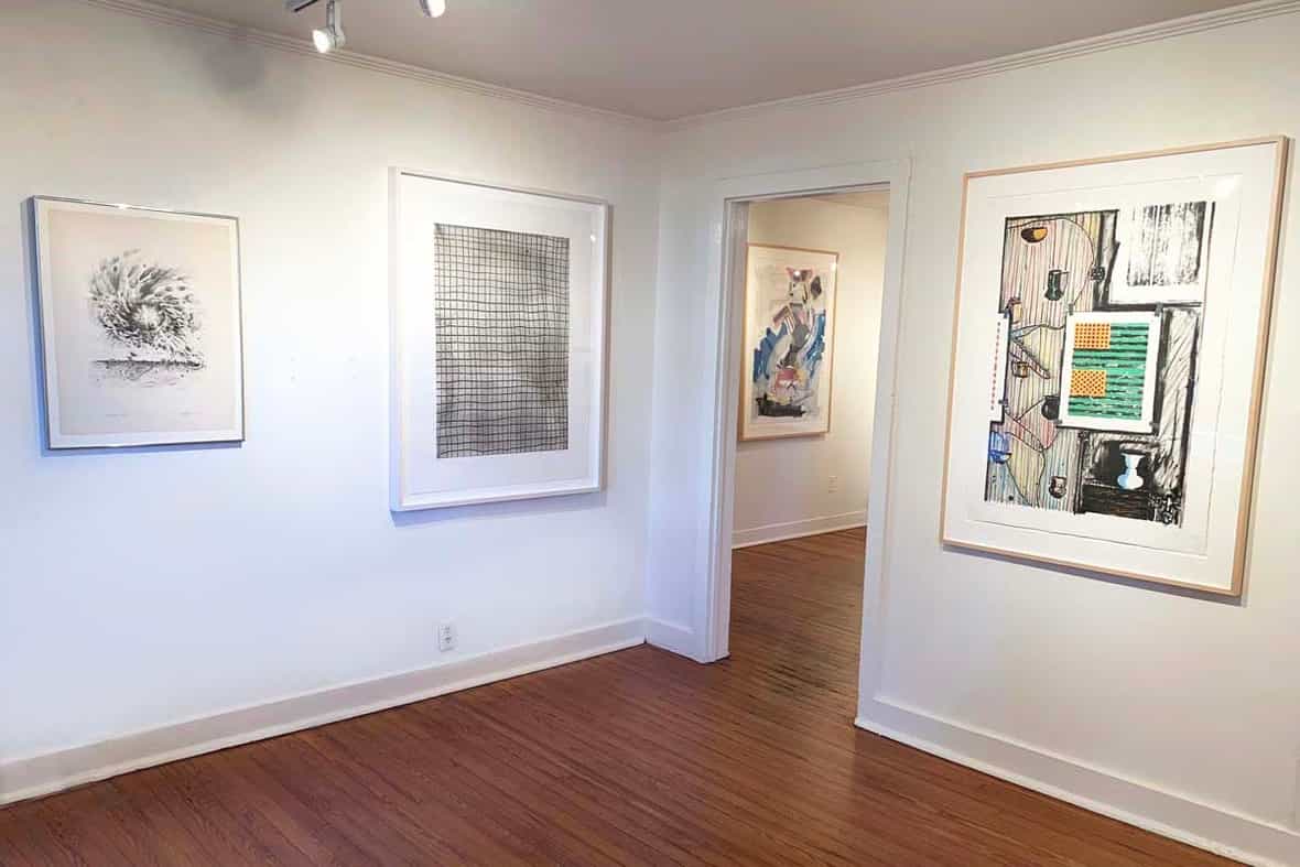 Gallery view of framed prints by Lee Bontecou, Sam Moyer, Larry Rivers, and Jasper Johns.