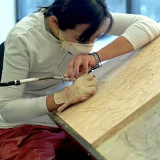 Orly Genger carving her first woodblock.