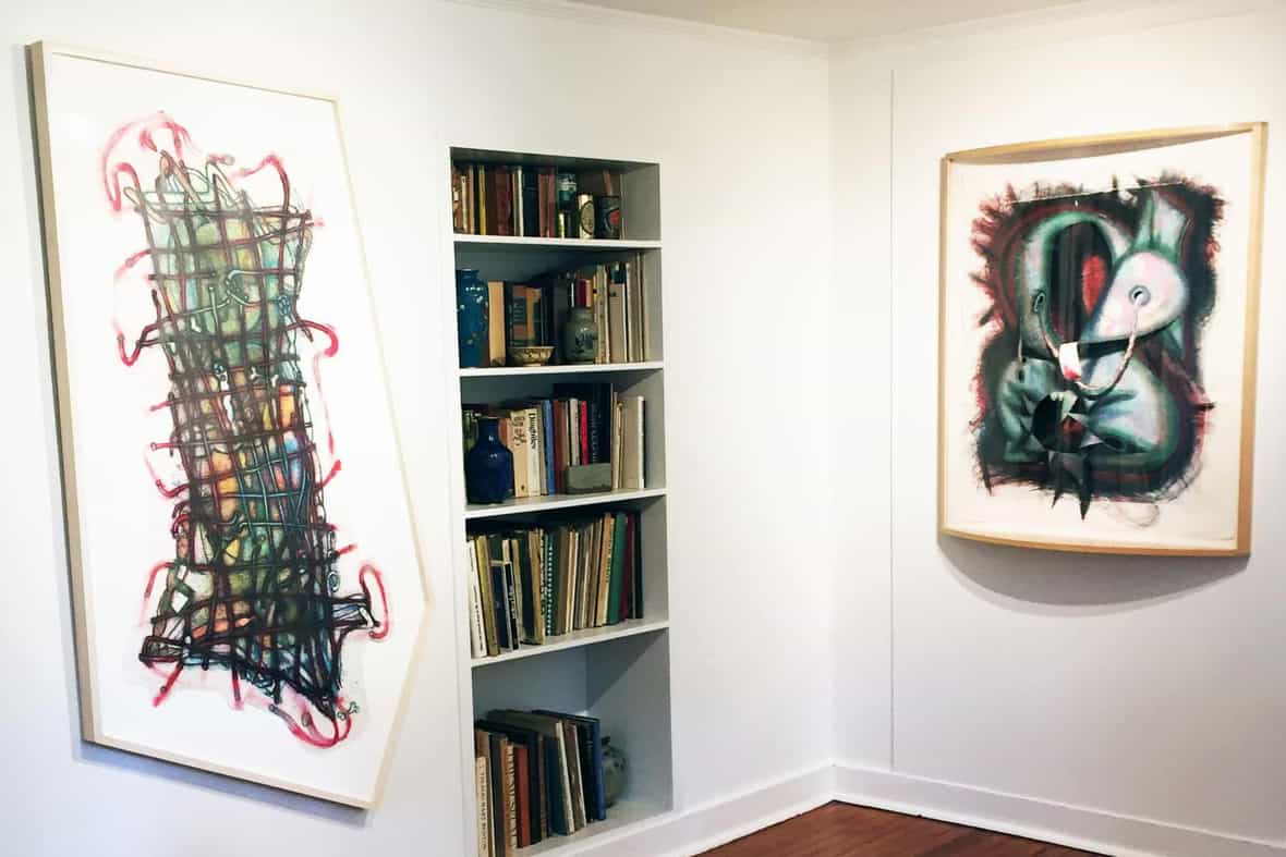 Gallery view of two framed works by Elizabeth Murray, Wiggle Manhattan and Shoe String.