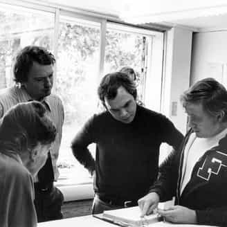 Tatyana Grosman, Tony Towle, Christian Gheelhaar, and James V. Smith.  Geelhaar was visiting ULAE to research his book Jasper Johns: Working Proofs, published in 1979.