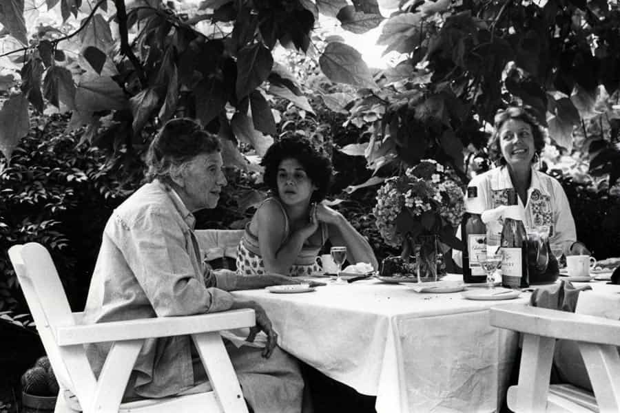 Tatyana Grosman and Judith Goldman enjoying lunch outside under the Catalpa Tree.