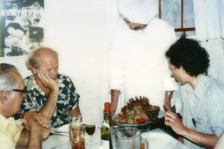 Bob Voight serving lunch to James Rosenquist and guests at Skidmore Place.