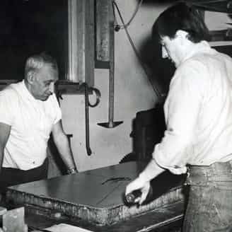 Tatyana Grosman's husband Maurice Grosman assisting Ben Berns in printing Robert Motherwell's Leonardo's Wall.