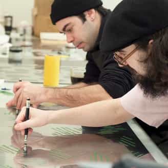 Kyle Gruber and Jason Miller working on plates for Jasper Johns' Within.