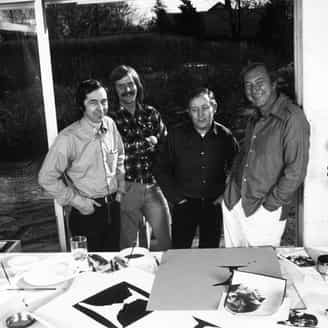 Printers Bill Goldston, John Lund and James V. Smith with Jasper Johns and proofs of his print Cup 2 Picasso. 