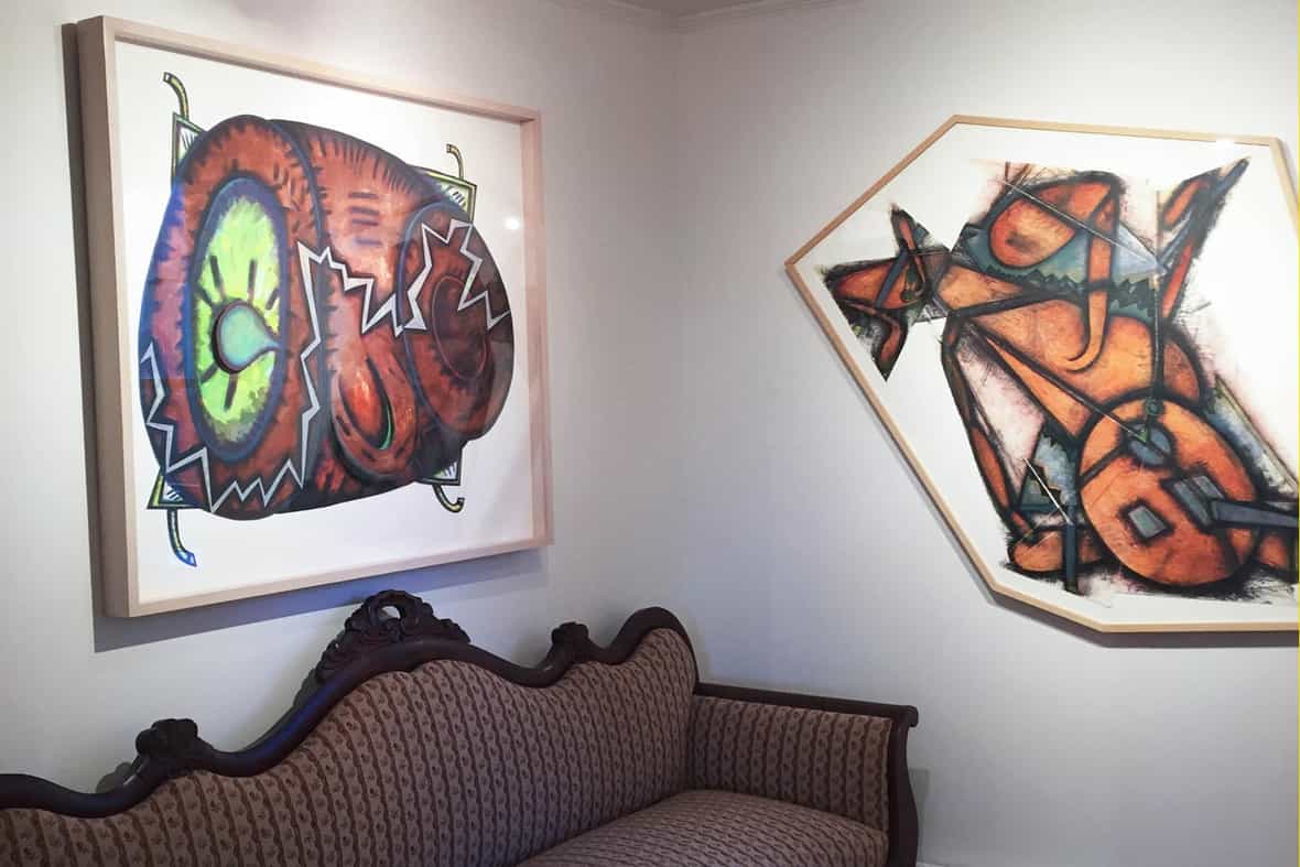 Gallery view of two framed works by Elizabeth Murray, Cracking Cup and Down Dog.